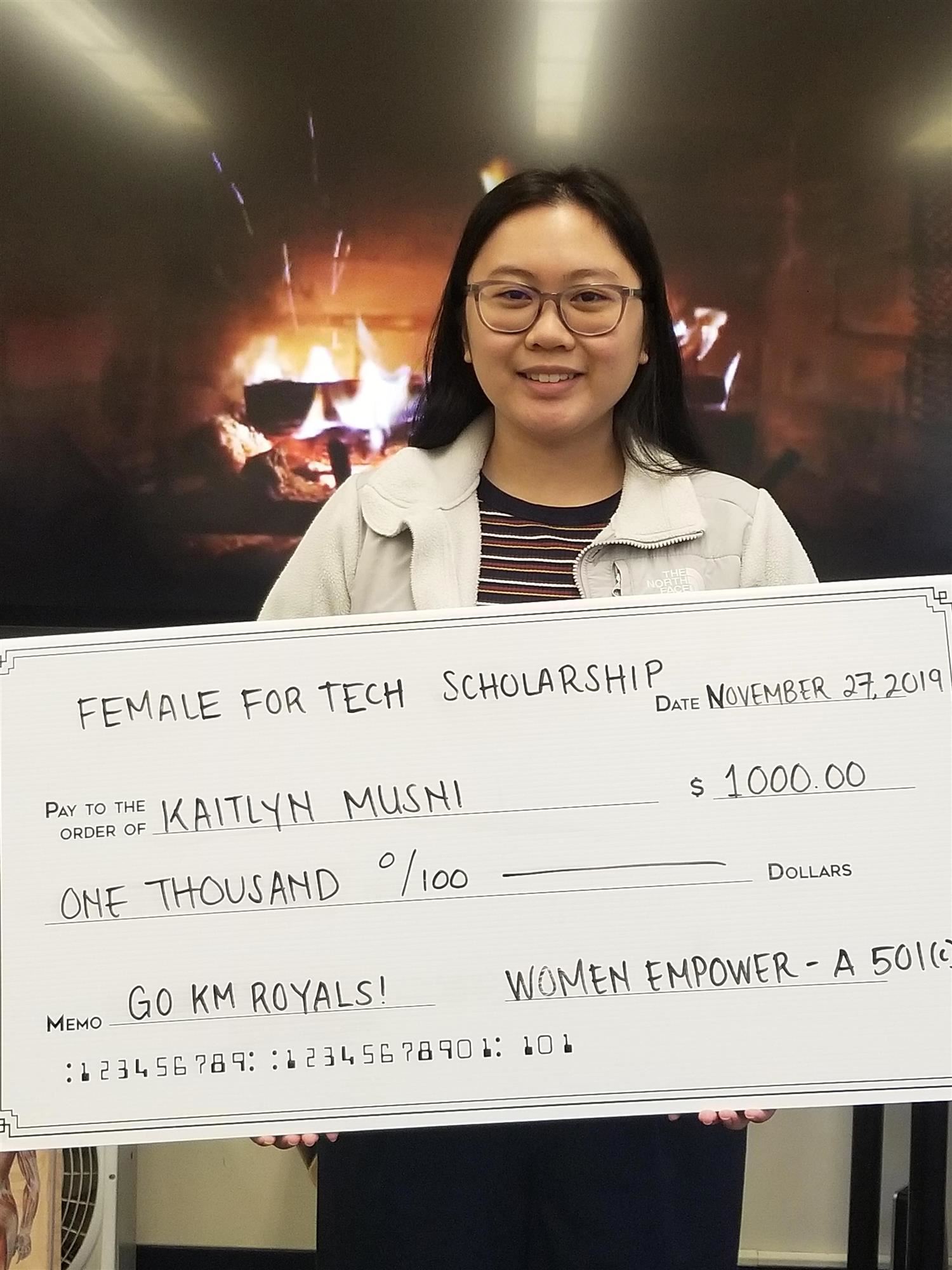 Student Receives Scholarship from Mrs. World